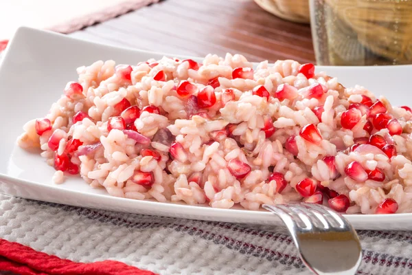 Risotto met granaatappel — Stockfoto