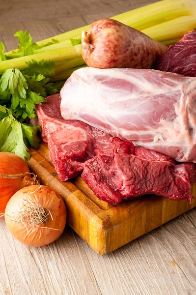 Raw meat with vegetables — Stock Photo, Image