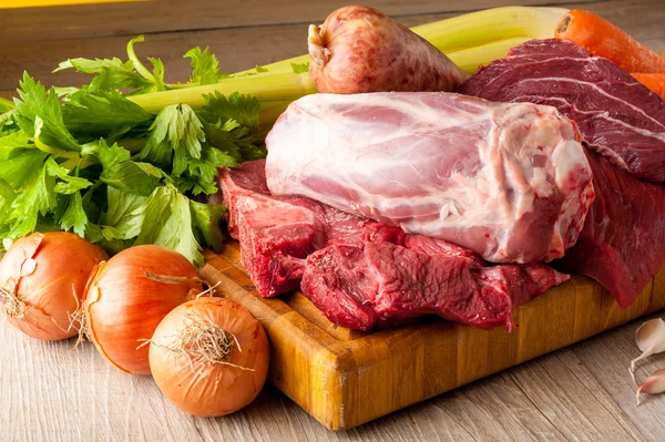 Raw meat with vegetables — Stock Photo, Image