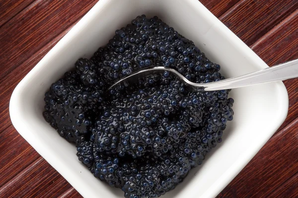Liten del av svart kaviar — Stockfoto