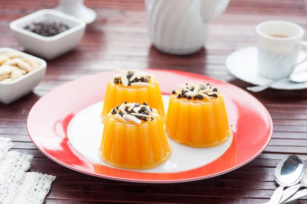 Three orange jelly dessert — Stock Photo, Image