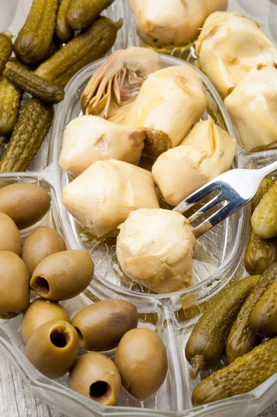 Pickles, mushrooms and olives — Stock Photo, Image