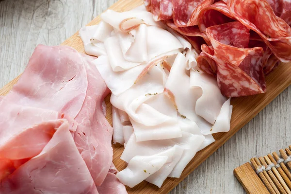 Cold cuts on  board — Stock Photo, Image