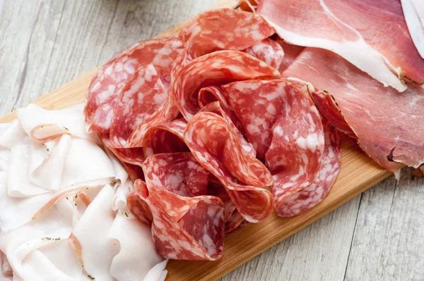 Cold cuts on  board — Stock Photo, Image