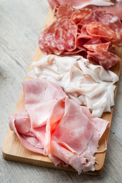 Cold cuts on  board — Stock Photo, Image