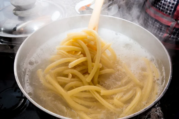 Pasta boiling in pot — Stock Photo, Image