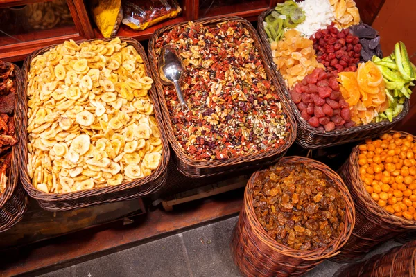 Dehydrated fruits in wicker baskets — Stock Photo, Image