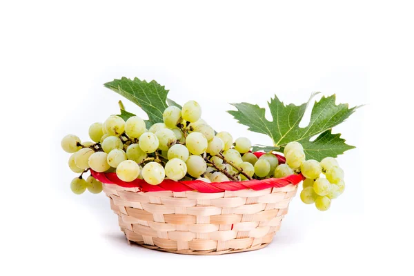 Wicker basket with grapes — Stock Photo, Image