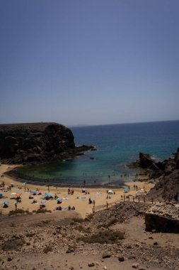 la playa ,el mar y el calor