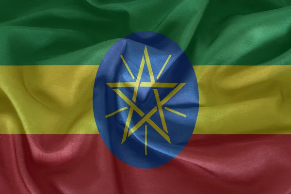 Ethiopia flag pattern on the fabric texture — Stock Photo, Image