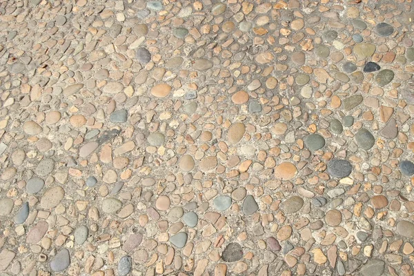Decorative floor pattern of gravel stones — Stock Photo, Image