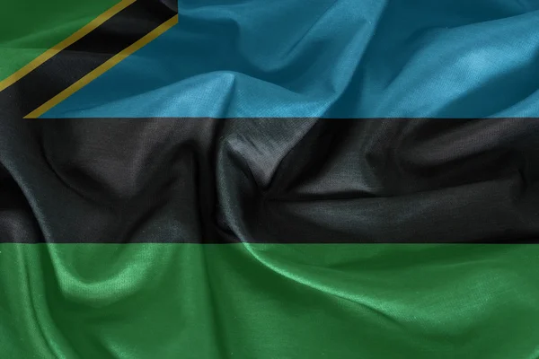 Zanzibar flagga mönster på tyg konsistens — Stockfoto