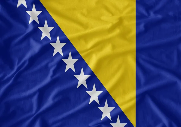 Waving Fabric Flag of Bosnia and Herzegovina — Stock Photo, Image