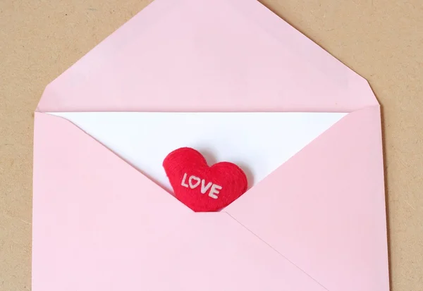 Love message with pink open envelope — Stock Photo, Image