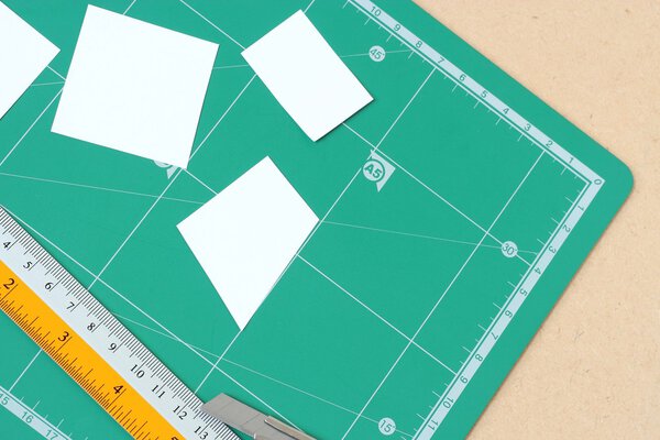 paper and green cutting mat
