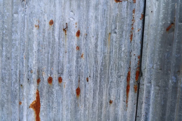 Vecchio zinco. vecchio zinco arrugginito. vecchia parete di zinco arrugginito plat. parete di zinco. ruggine zinco grunge texture — Foto Stock