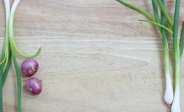 Green onion. Vegetarian food on wood — Stock Photo, Image