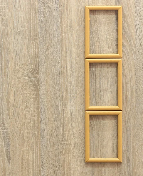 Marco de madera sobre fondo de madera — Foto de Stock