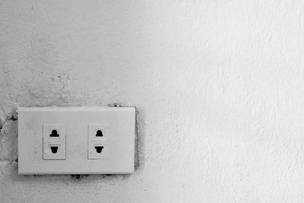 Old electrical outlet on a wall — Stock Photo, Image