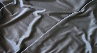 Siyah buruşuk malzeme arka plan veya doku