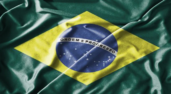 Махающий тканевым флагом Бразилии гранж — стоковое фото