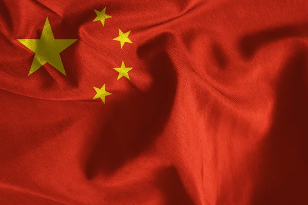 China waving on fabric flag