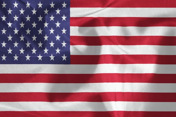 Nahaufnahme einer zerzausten amerikanischen Flagge — Stockfoto