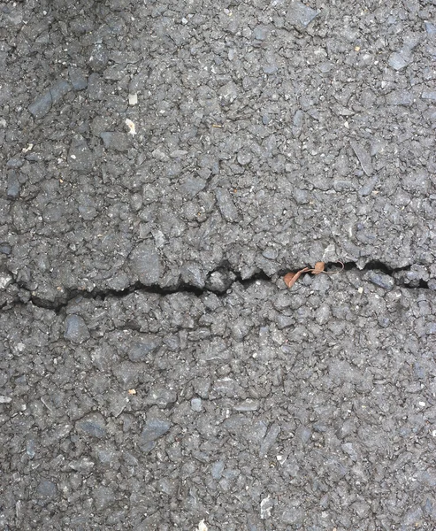 Asphalt texture with cracks — Stock Photo, Image