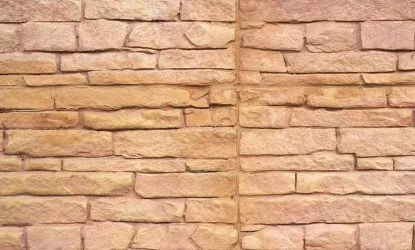 Närbild på en tegelvägg, moderna sten textur bakgrund — Stockfoto