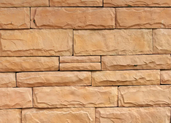 Närbild på en tegelvägg, moderna sten textur bakgrund — Stockfoto