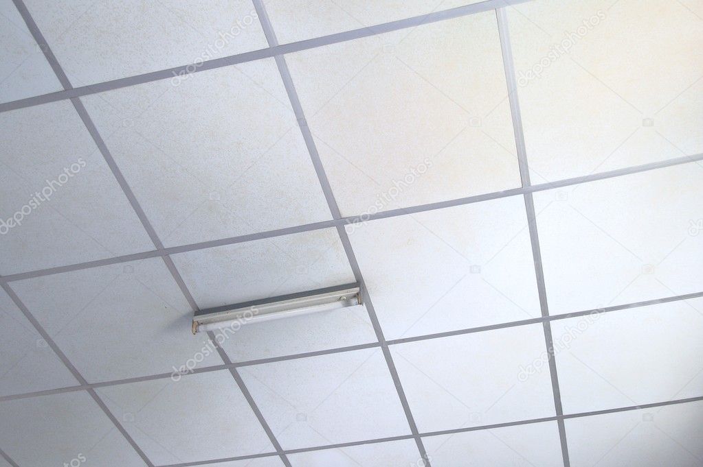 Old Texture of white panels for suspended ceiling.