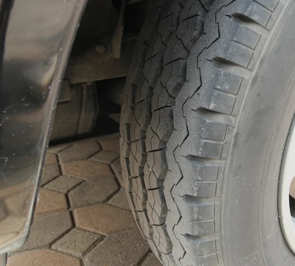 Brand New Car Tire Closeup Photo. Modern Car Tire — Stock Photo, Image