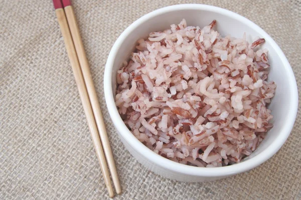 Brown rice in bowl — Stock Photo, Image