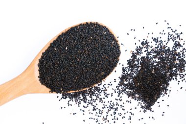 Siyah susam tahta kaşık koymak