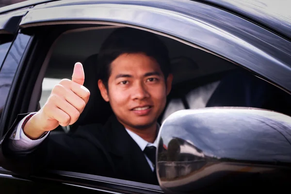 Business man showing key — Stock Photo, Image