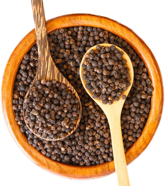 Black pepper on wooden — Stock Photo, Image