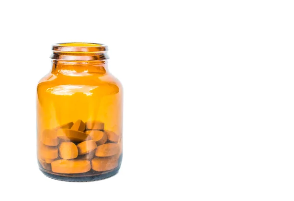 Yellow pins in bottle — Stock Photo, Image