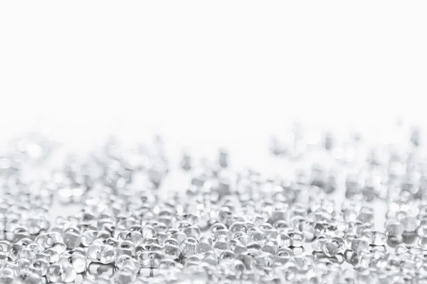 Minimalist abstract light background with transparent glass particles. — Stock Photo, Image