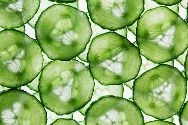 Cucumber slices. Pattern. Food background. Macro. Texture. — Stock Photo, Image