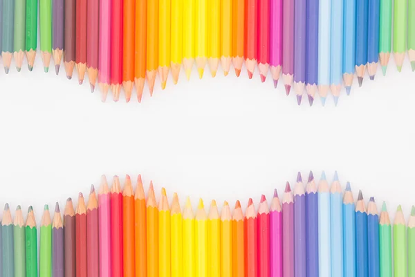 Colored pencils in rainbow order on white background. Pencils background.  Stock Photo by ©alinayudina 115816704