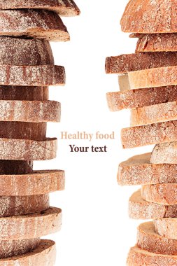 Pile of slices of black rye bread and white bread with a crispy crust on a white background. Decorative ending, border. Isolated. Concept art. Food background. clipart