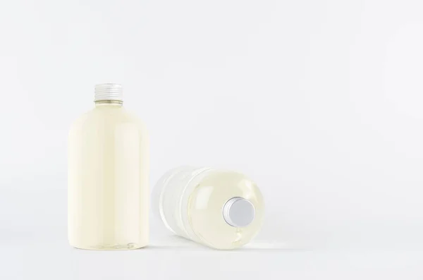 Set Van Twee Doorzichtige Plastic Lage Dikke Flessen Staand Liggend — Stockfoto