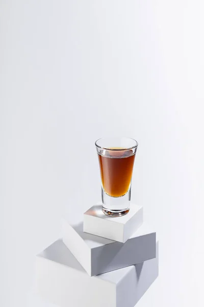 Golden Brandy Shot Glass Hard Light Shadow Reflection High Stack — Stock Photo, Image