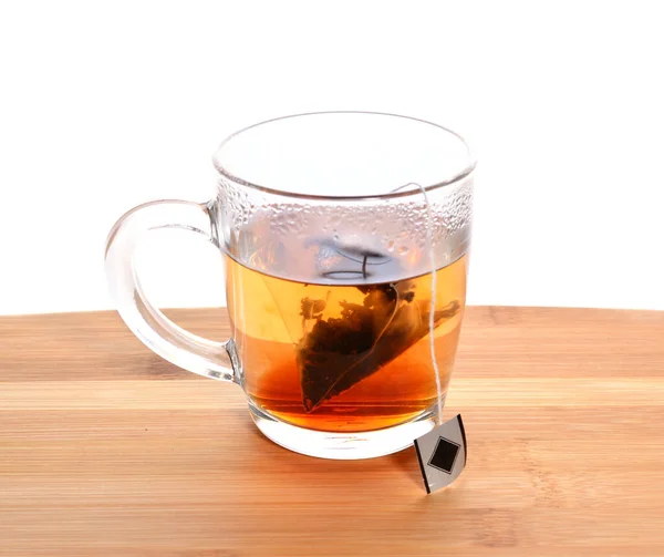 Fabricou Saco Chá Preto Uma Caneca Transparente Uma Mesa Madeira — Fotografia de Stock