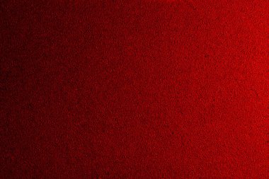 Dökme demirin arka planında kırmızı renkli, metal bir yapı var. Boşluğu kopyala.