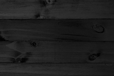 Siyah ahşap doku, eserin daha ilginç görünmesi için tasarım ya da metin alanında bir arkaplan yapmak için mükemmeldir. Fantastik kopyalama alanı olan boşluk, siyah yüzey kavramı