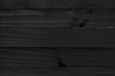 Metin veya tasarım için kopyalama alanı olan siyah ahşap doku arka planı. Yüksek kalite ve çekicilik işinizi seyirciye güzel ve büyüleyici gösterir. Siyah yüzey kavramı