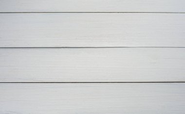Ahşap tablo beyaz doku arka planını tasarımlarınız için kopyalama alanı ile boyadı ya da çalışmayı daha iyi göstermek için metin ekleyin. Web sitesi veya duvar kağıdı için yüksek çözünürlüklü ahşap zemin. doğal olarak malzeme kullanımı