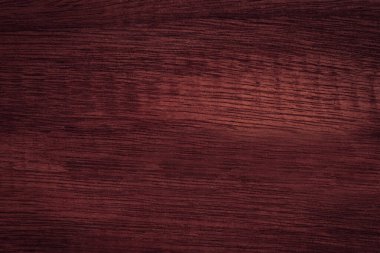 Ilık ahşap ahşap masa dokusu yüksek kaliteli arka plan grunge tarzında koyu doğal ahşaptan yapılmış. Tasarımınız veya metniniz için boşluk kopyalayın. Yüzey desenli yatay bileşim