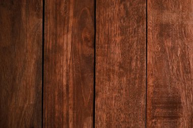 Dikey, güzel, kahverengi ahşap döşeme, yüksek kaliteli arka plan, koyu doğal ahşaptan, grunge tarzı. Tasarımınız veya metniniz için boşluk kopyalayın. Yüzey desenli düzenleme konsepti